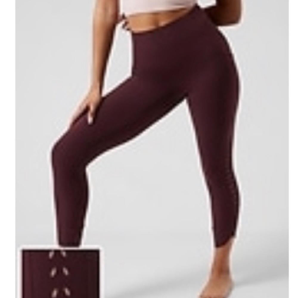 Athleta laser cut salutation stash 7/8 leggings size xs NWT spaced cabernet